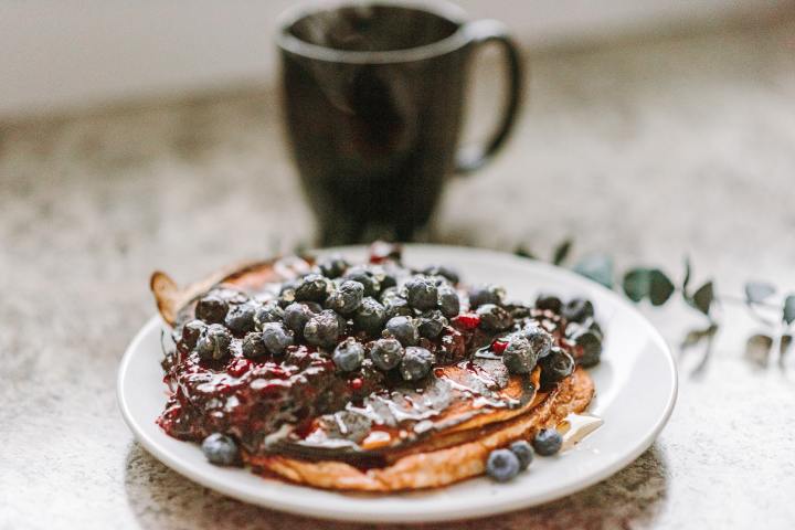 blueberry pancake on a white plate